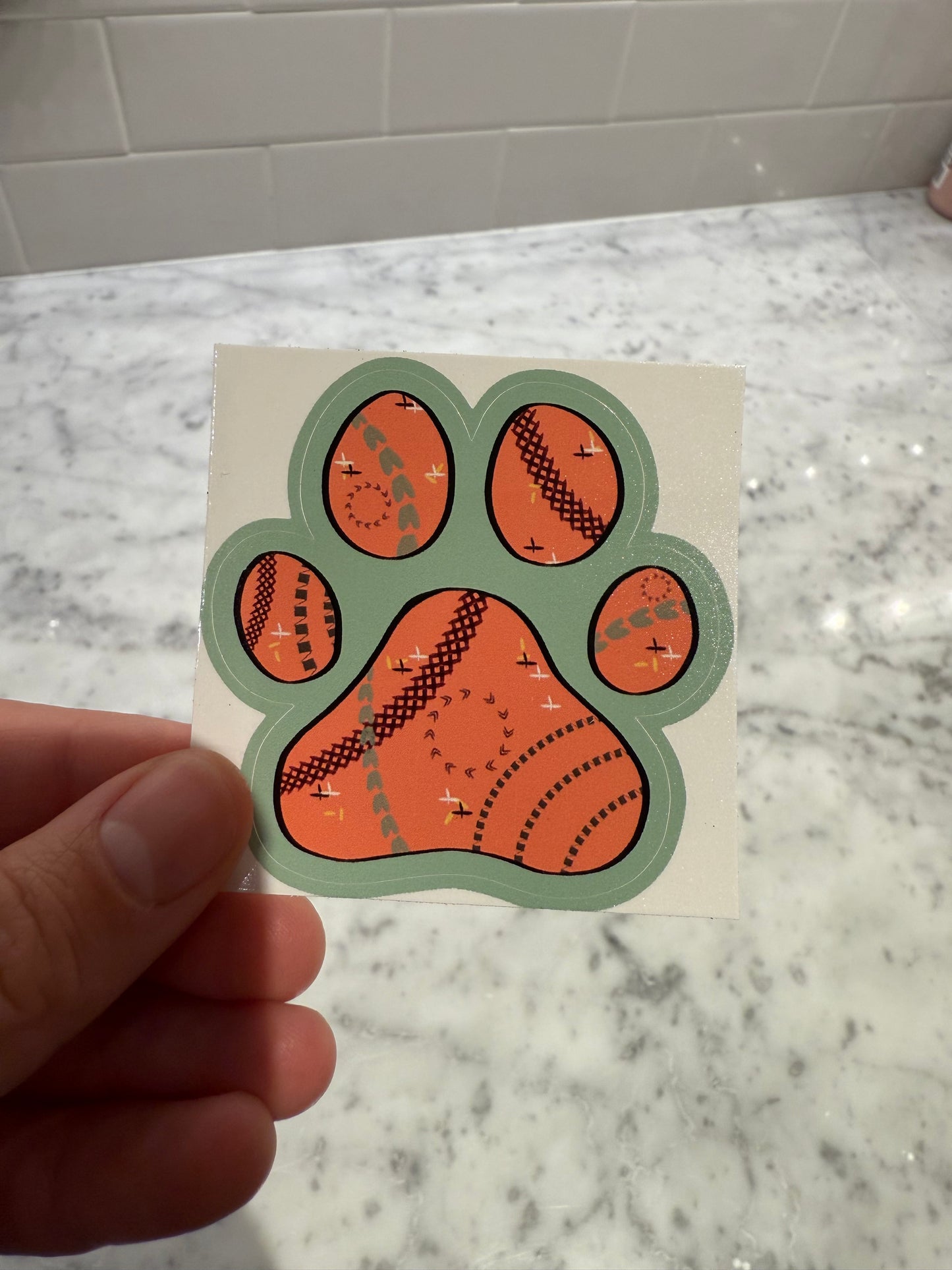 Orange paw print